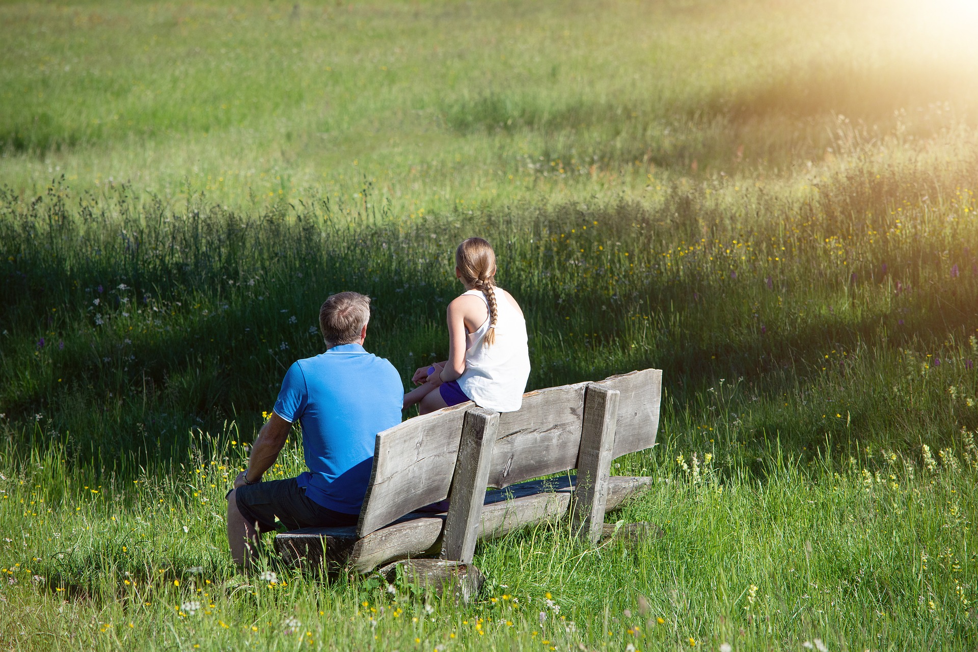man and woman on bench